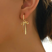 Bow Knot Drop Earrings: Gold